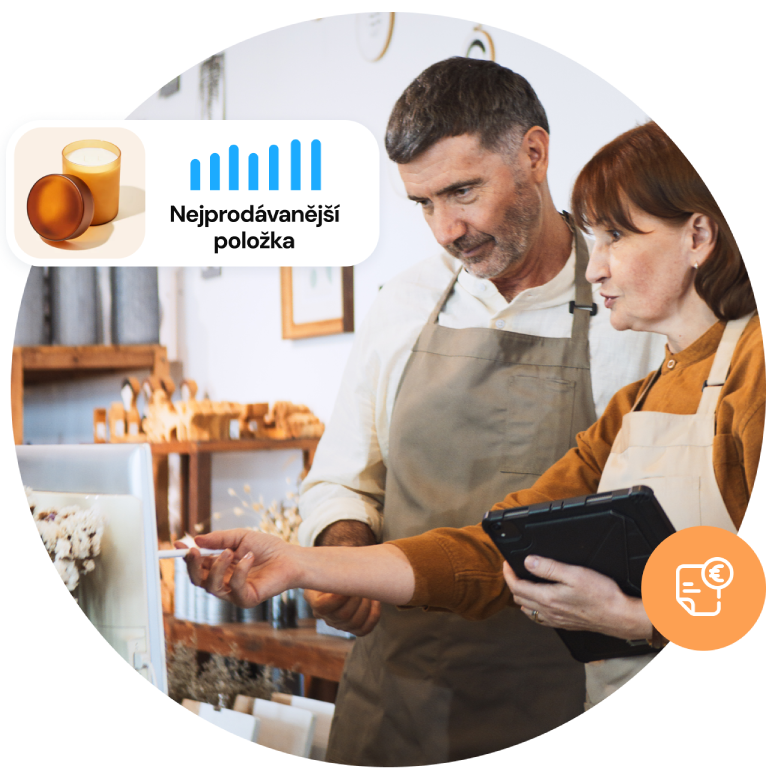 Male and female employees in a bakery holding a tablet and talking
